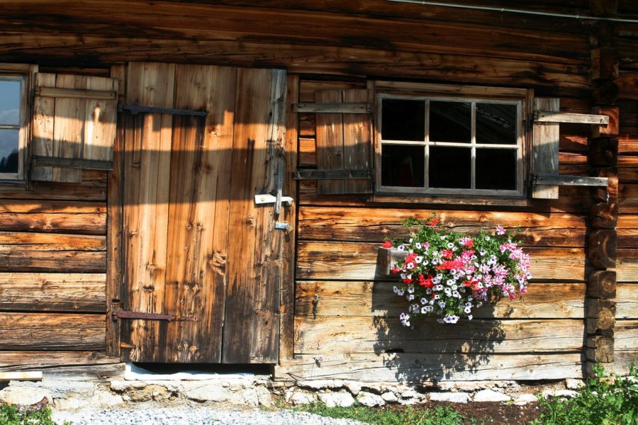 Wooden cottage front with window box